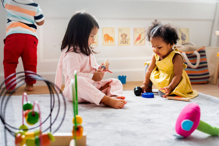 Two children playing in a preschool