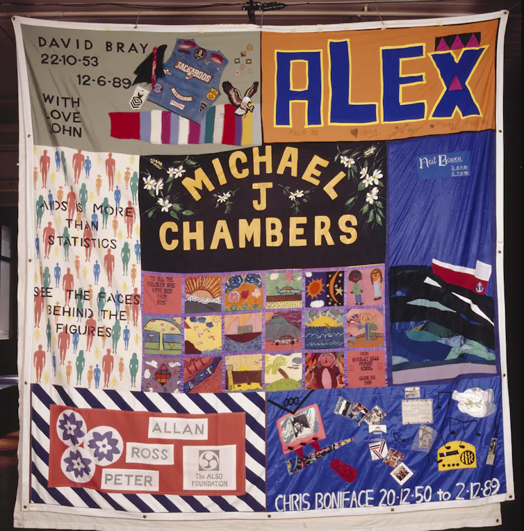 A quilt embroidered with the names of people who died of AIDS.