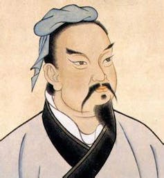 A bearded Chinese man.