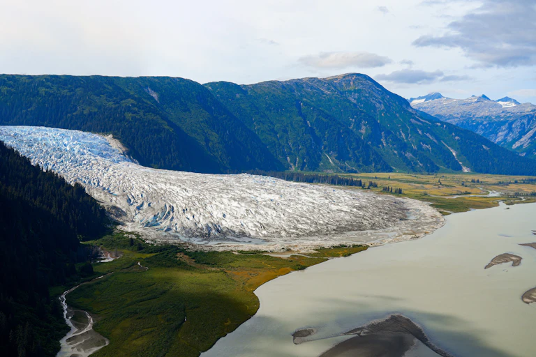 Large glacier flows out of valley