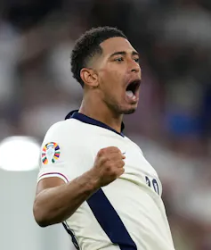 England footballer Jude Bellingham raises his fist in celebration of his goal against Slovakia at Euro 2024
