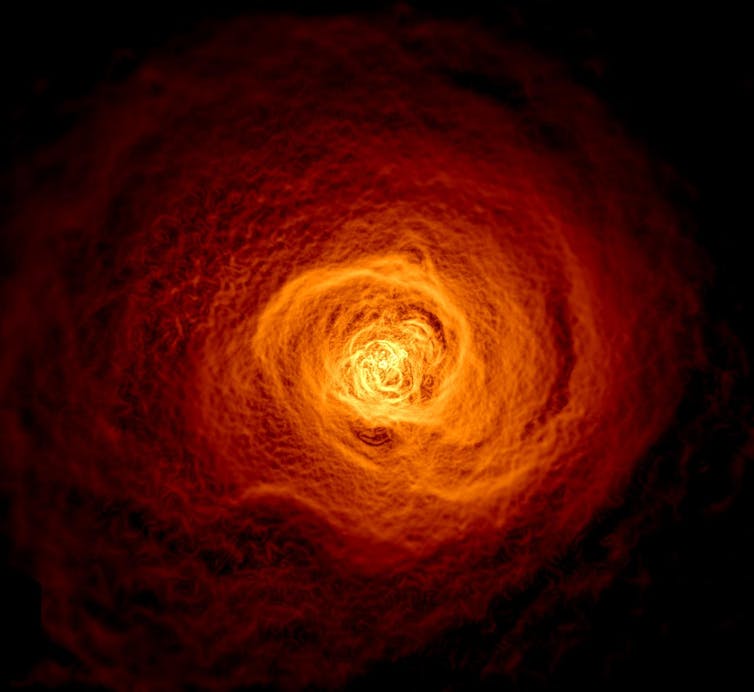 a fiery orange swirl against a dark background