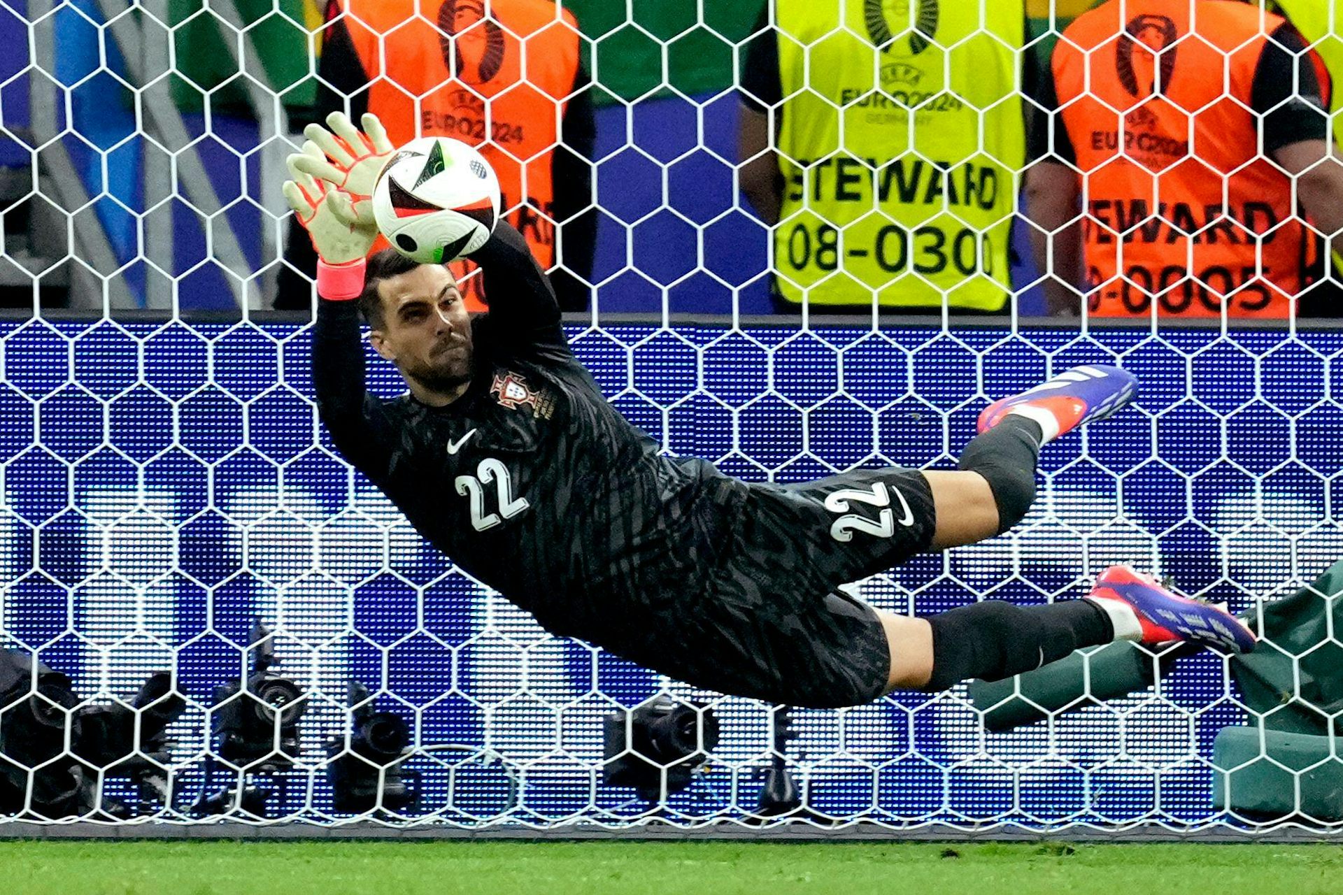 Goalkeeper saving a goal