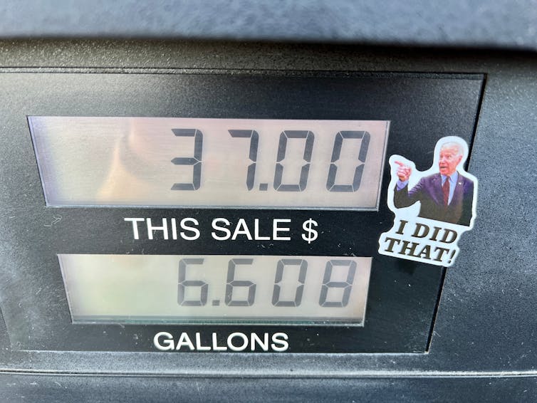 Petrol pump screen with sticker of Joe Biden and the words 'I did that'.