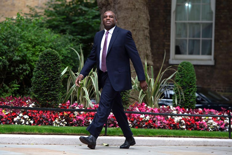 David Lammy walking.