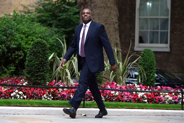 David Lammy walking.