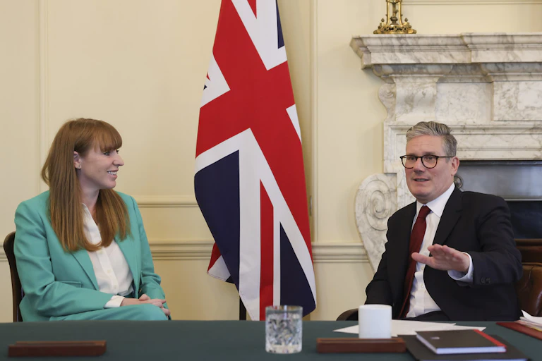 Angela Rayner and Keir Starmer sitting at a table inside Number 10