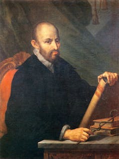 A man holding a book.