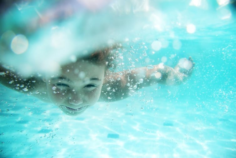 A child swimming.