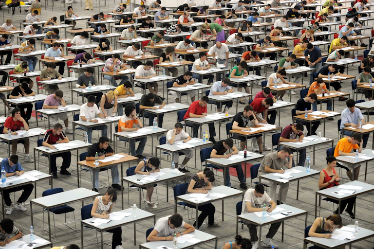 Students taking exam for university.