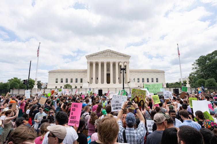 A crowd of demonstrators gathered outside the US Supreme Court.