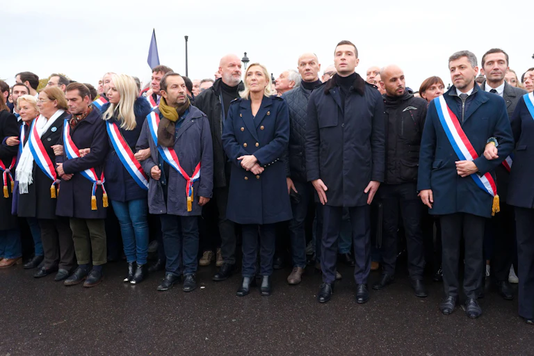 Marine Le Pen, Jordan Bardella and members of the French National Front (RN)