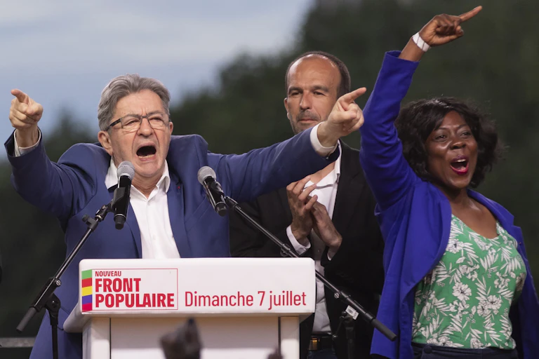 Leader of La France Insoumise (LFI) Jean-Luc Melenchon, LFI President Manuel Bompard and newly re-elected LFI Deputy Daniele Obono react to the result of Leader of La France Insoumise (LFI) Jean-Luc Melenchon, LFI President Manuel Bompard and newly re-elected LFI Deputy Daniele Obono