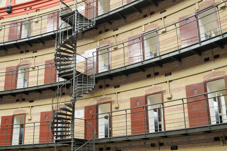 Interior of the round dome prison koepelgevangenis in Breda, the Netherlands, with open cell doors