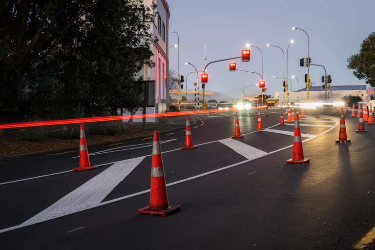 Orange traffic cones lined up on the road