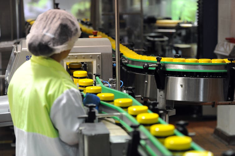 Woman working on a production line