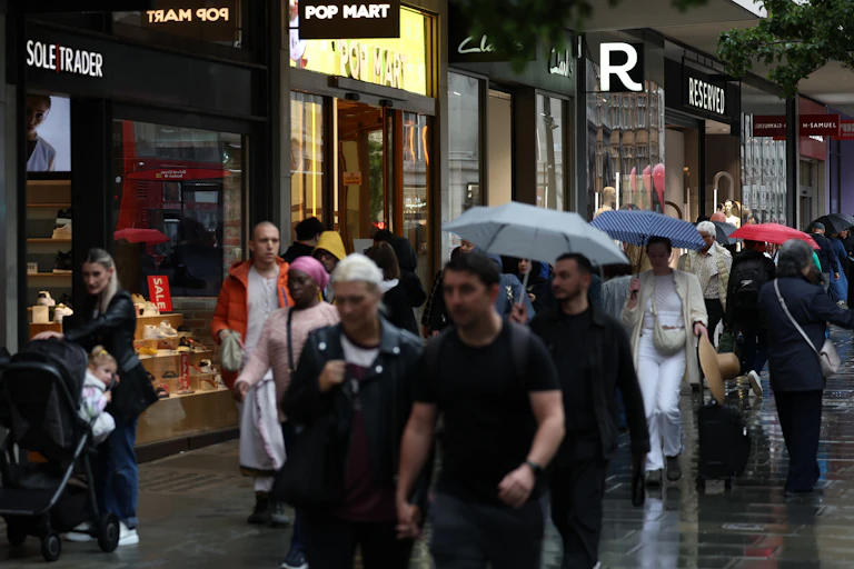 A British high street in the rain.