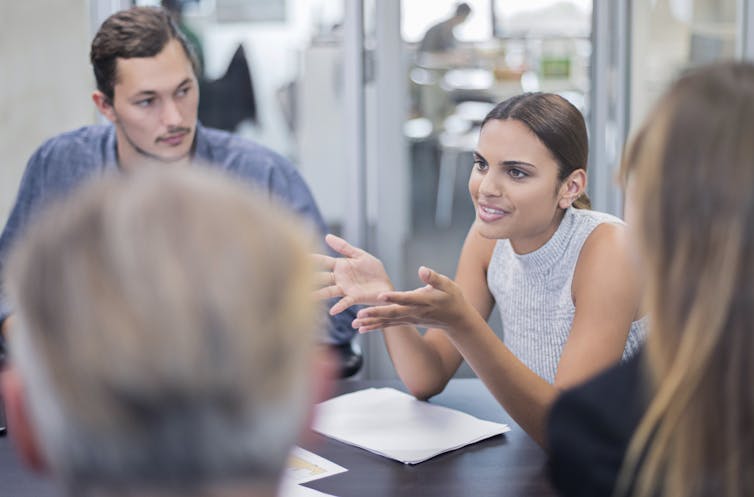 Aboriginal businesswoman talking in a meeting