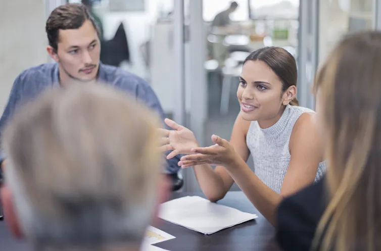 Aboriginal businesswoman talking in a meeting