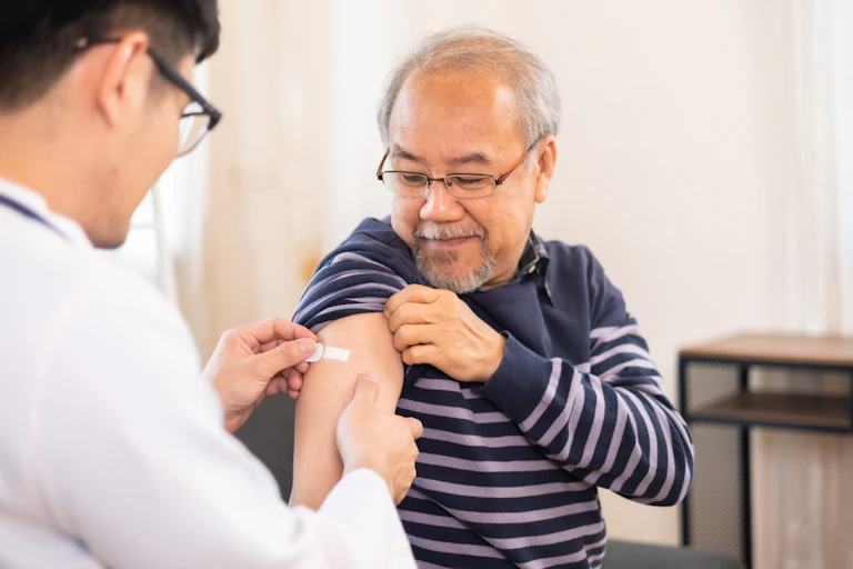 GP puts bandaid on older patient