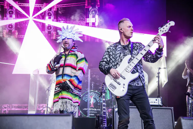 Two musicians on stage.