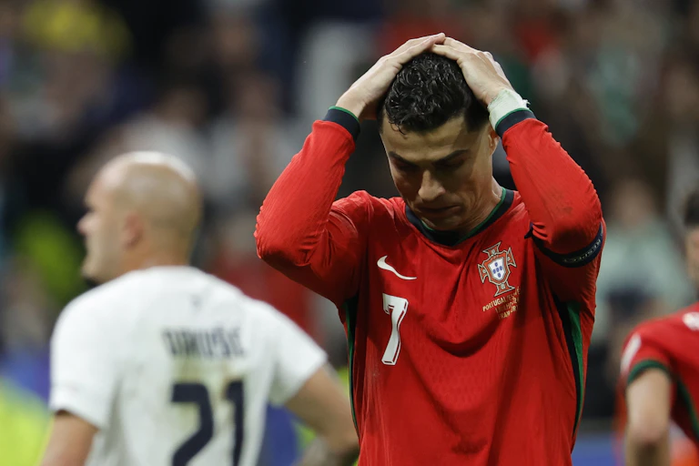 Christiano Ronaldo looks disappointed.