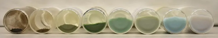 Small vials filled with the quatum dots. The powders are all different colours and are developed using flame spray pyrolysis.