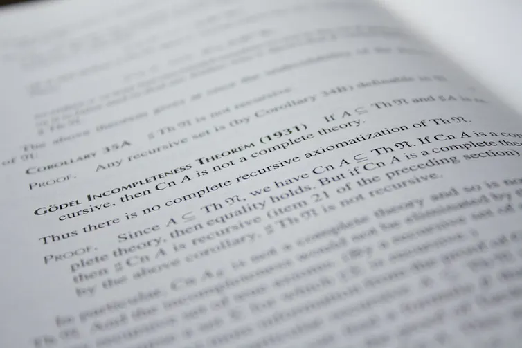 Photo d’un livre de mathématiques en anglais présentant l’un des théorèmes de Gödel