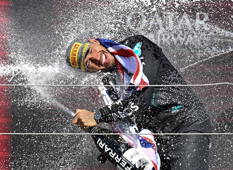 Lewis Hamilton celebrating a win
