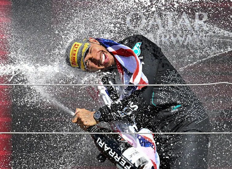 Lewis Hamilton celebrating a win