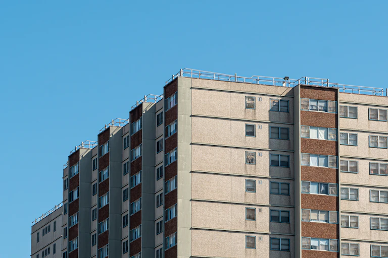 Photograph of the upper floors of a concrete social housing tower
