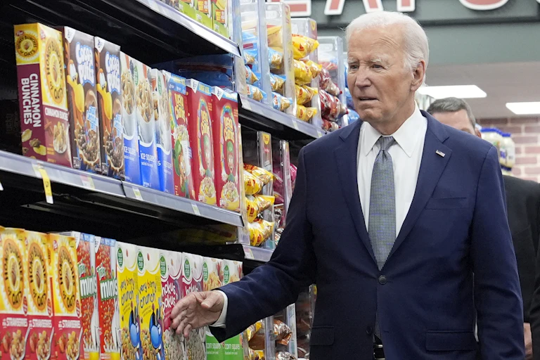 US President Joe Biden in cereal isle at supermarket