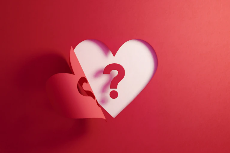 Illustration of cutout of heart from red paper with question mark in its center