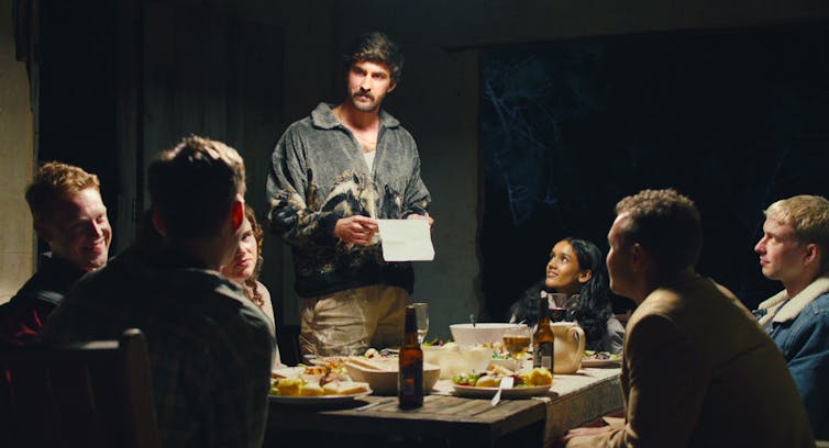 Men and women around a table