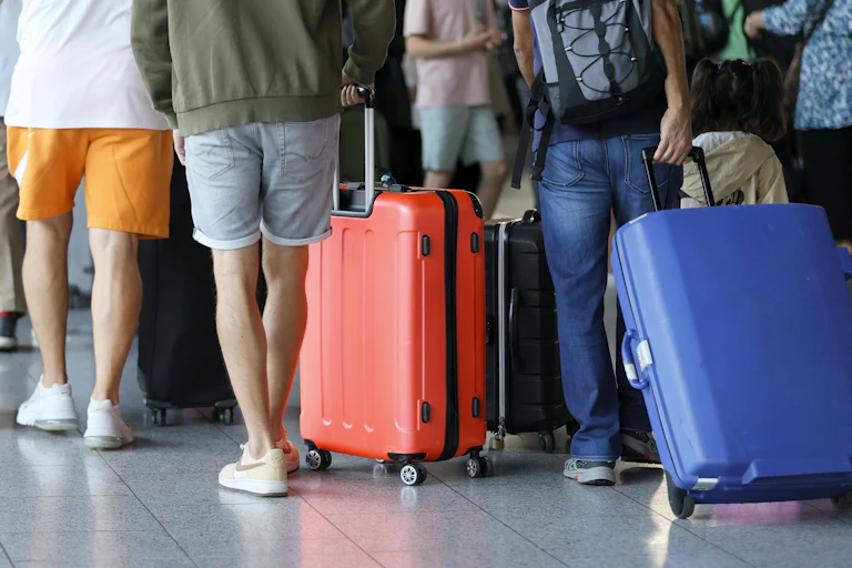 Passengers waiting to check in