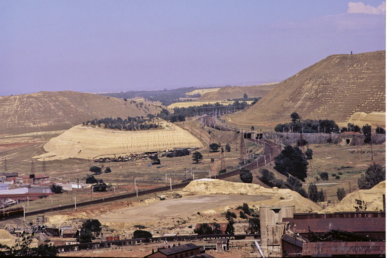 A big mound of earth next to a gold mine