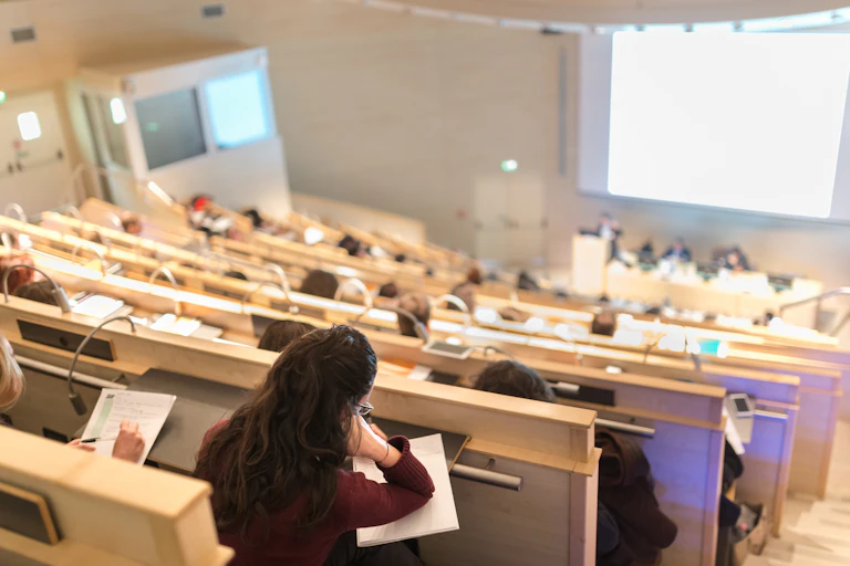 Students in tiered lecture theatre