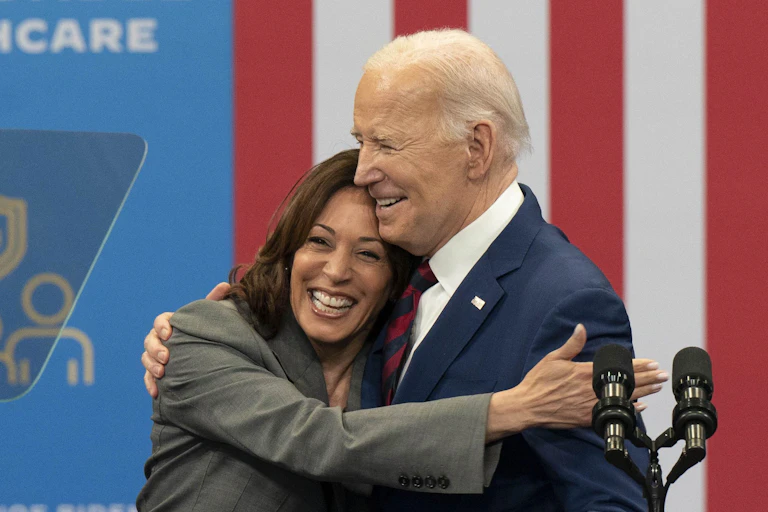 US vice=president Kamala Harris, hugging US president, Joe Biden.