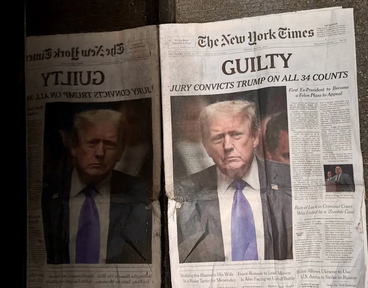 A newspaper with a huge 'GUILTY' banner headline and a photo of Donald Trump.
