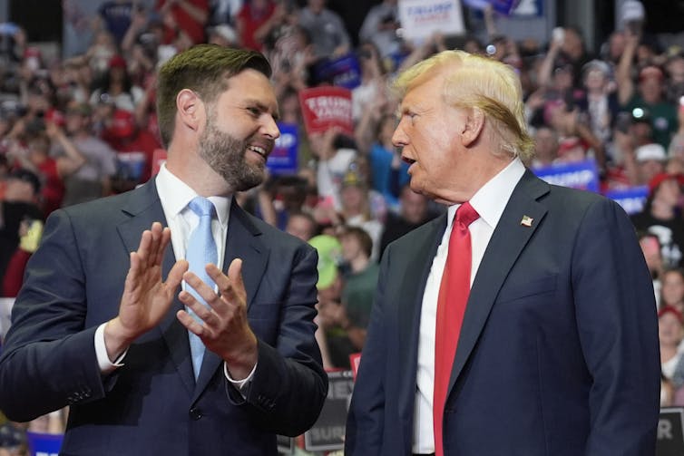 Donald Trump and J.D. Vance at a campaign rally in Michigan.