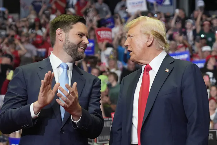 Donald Trump and J.D. Vance at a campaign rally in Michigan.
