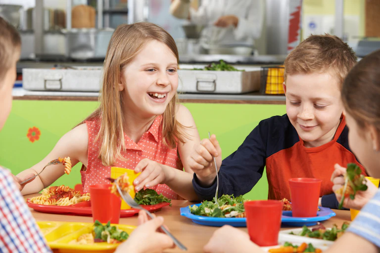 Children eating lunch at school