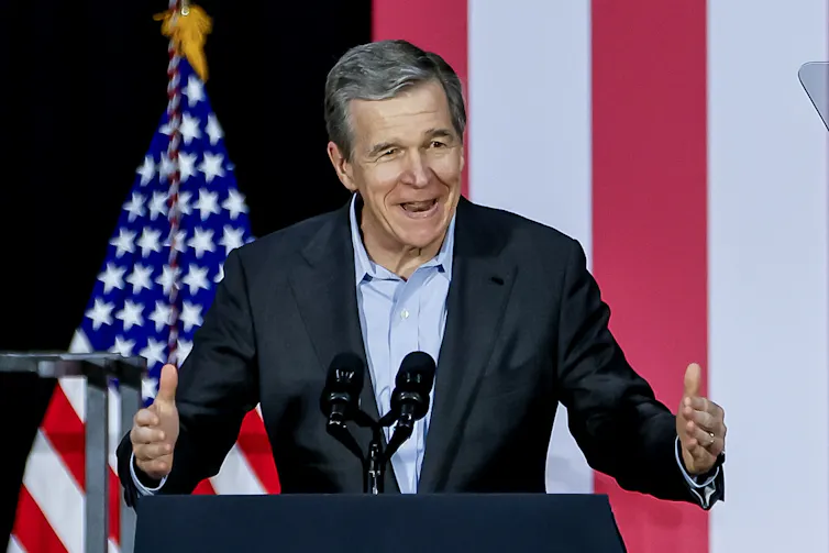 Roy Cooper at a podium