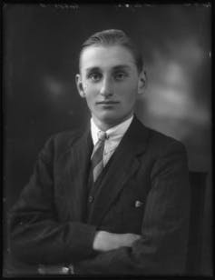 Black and white photo of a man in a suit
