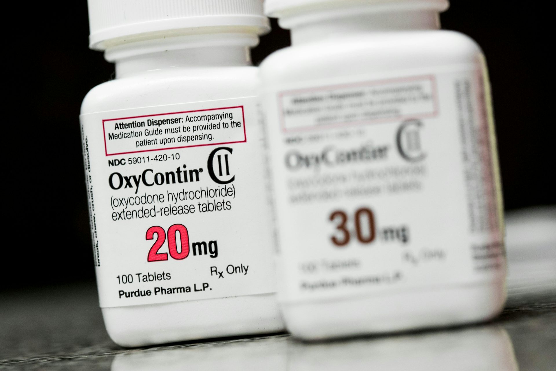 Bottles of OxyContin (Oxycodone) prescription pharmaceuticals photographed in a pharmacy