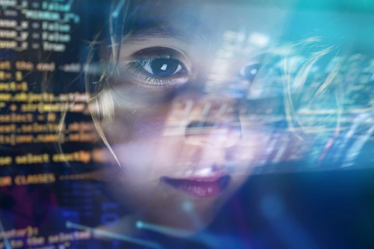 Close up of a little girl looking at some futuristic holograms.