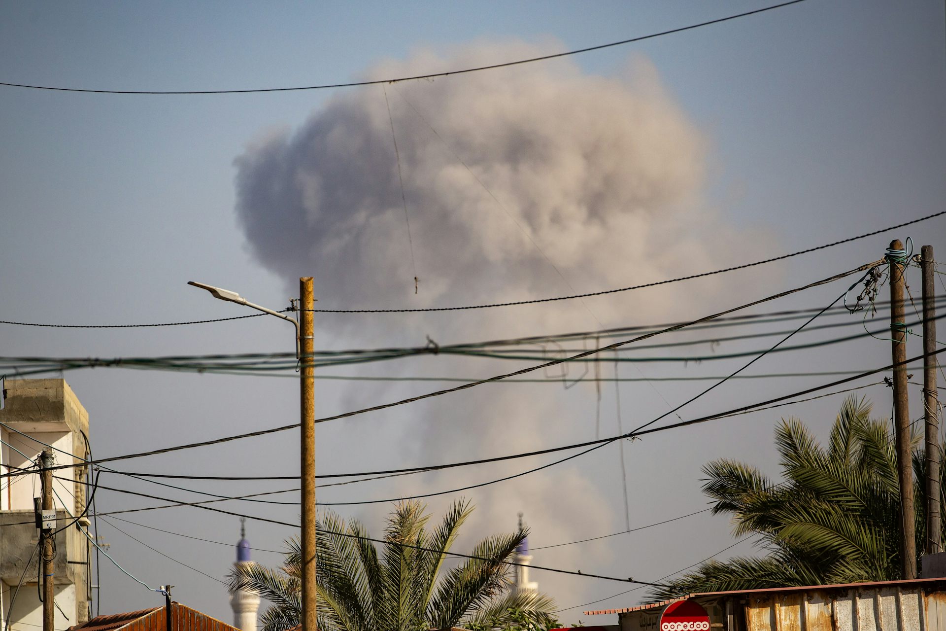A plume of smoke rising following an airstrike in Gaza.