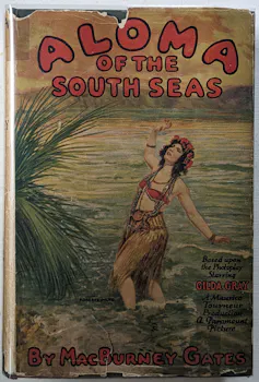 front cover of the novel, Aloma of the South Seas, showing a girl in a grass skirt and bikini top, standing in teh waves, with a palm tree beside her