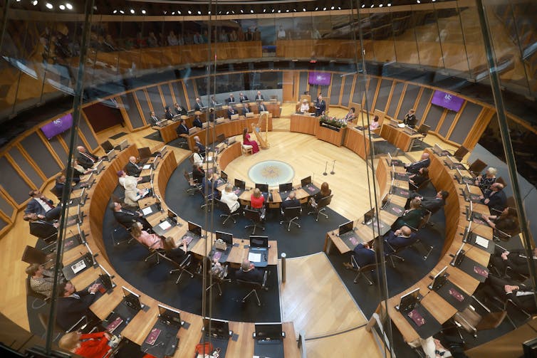An overhead view of the Senedd chamber in Cardiff.
