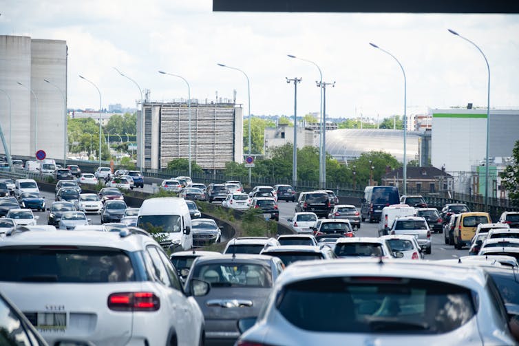 A motorway featuring heavy traffic.